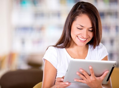 Woman studying American Accent Course on ipad.